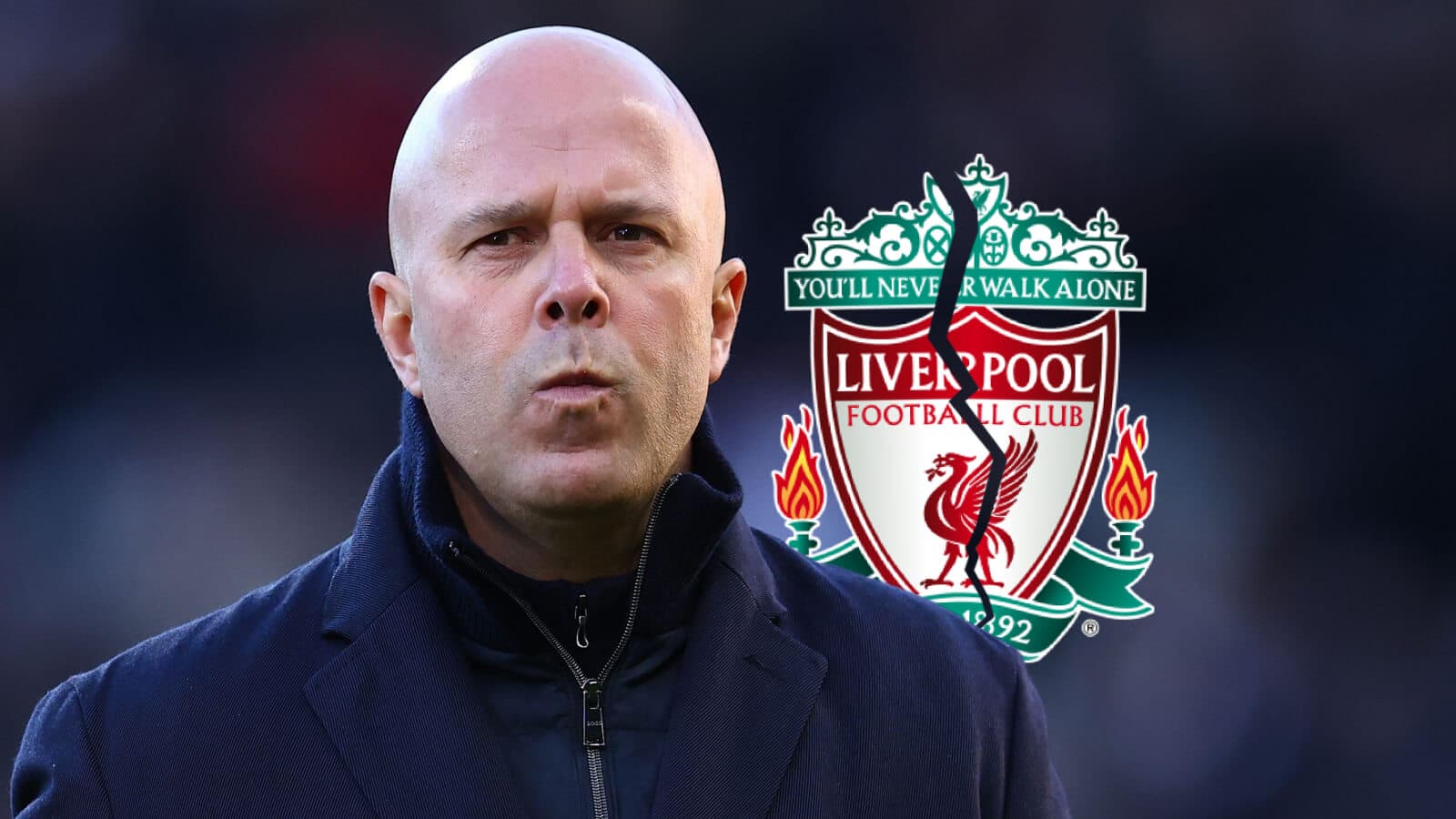Coach with Liverpool FC logo in background