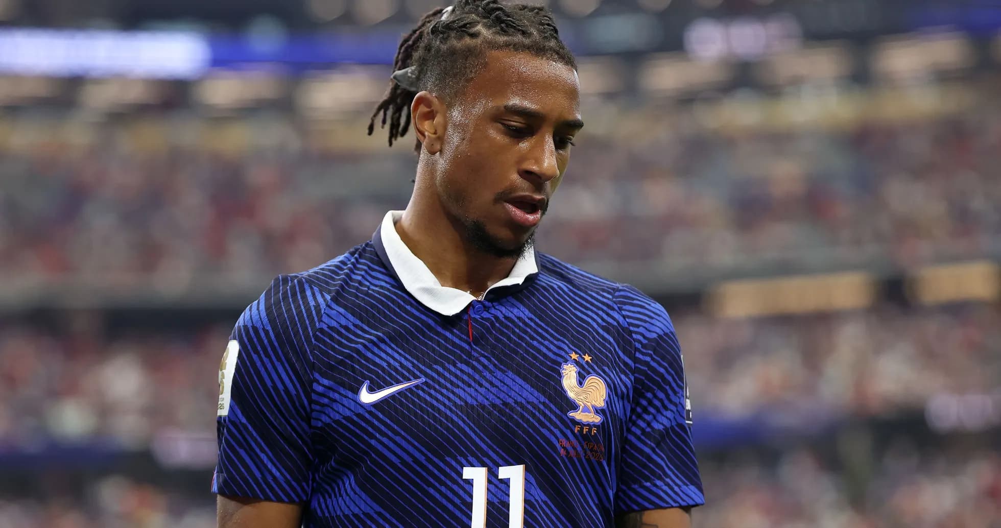 Player in blue France jersey during match