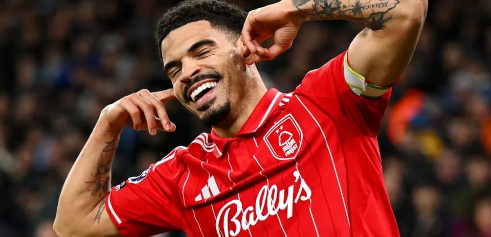 Player celebrating a goal in red jersey