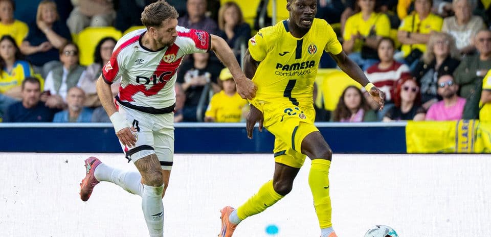 Rayo Vallecano player challenging Villarreal opponent