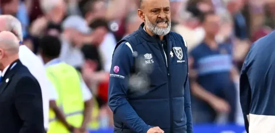 Manager celebrating a goal on the sidelines