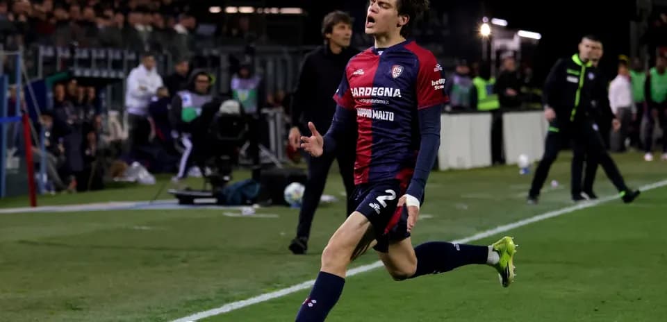 Player celebrating after scoring a goal on the pitch