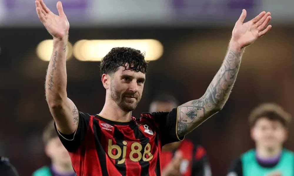 Player waving to fans after the match