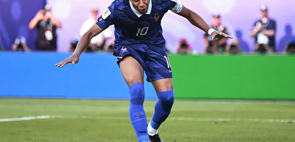 Player celebrating during France vs Paraguay match