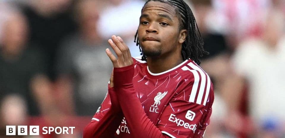 Player in Liverpool kit clapping during match