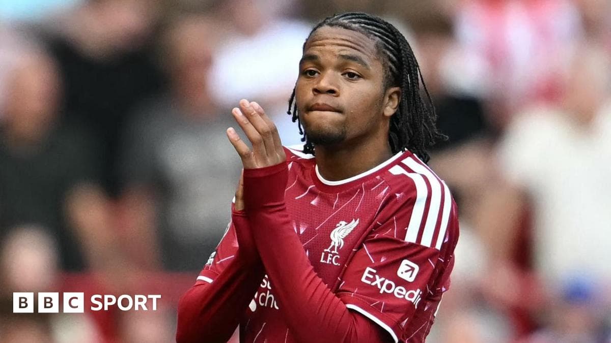 Player in Liverpool kit clapping during match