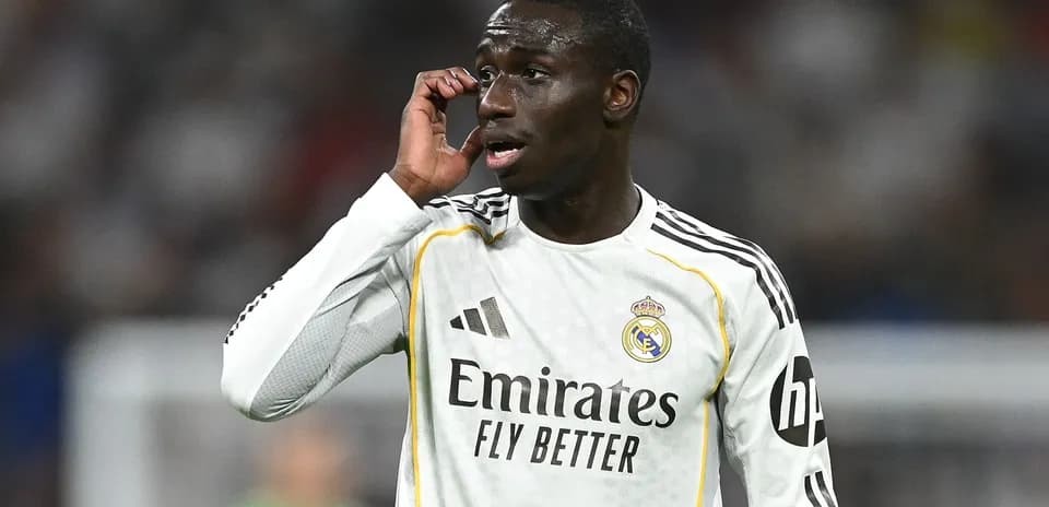 Player communicating during match in Real Madrid jersey