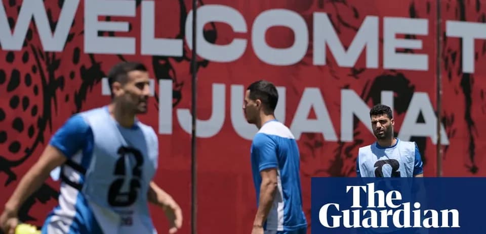 Players training with 'Welcome to Tijuana' sign behind