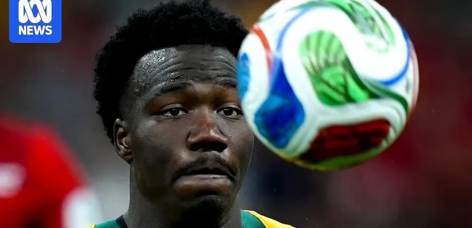 Player concentrating on the soccer ball in motion