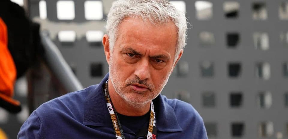 Manager observing from the sidelines during a match