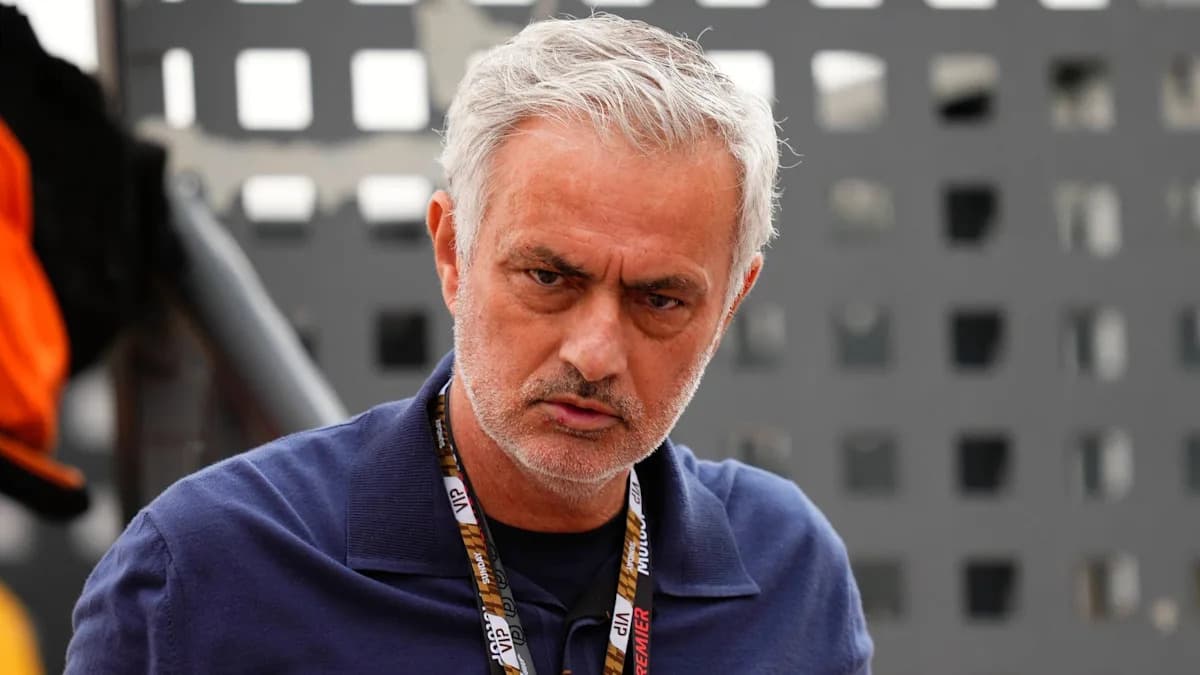 Manager observing from the sidelines during a match