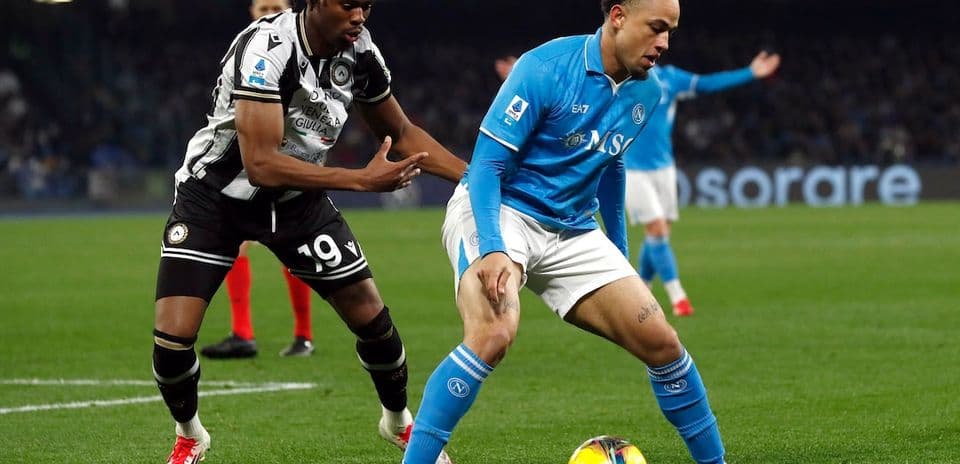 Players competing for the ball during Napoli match