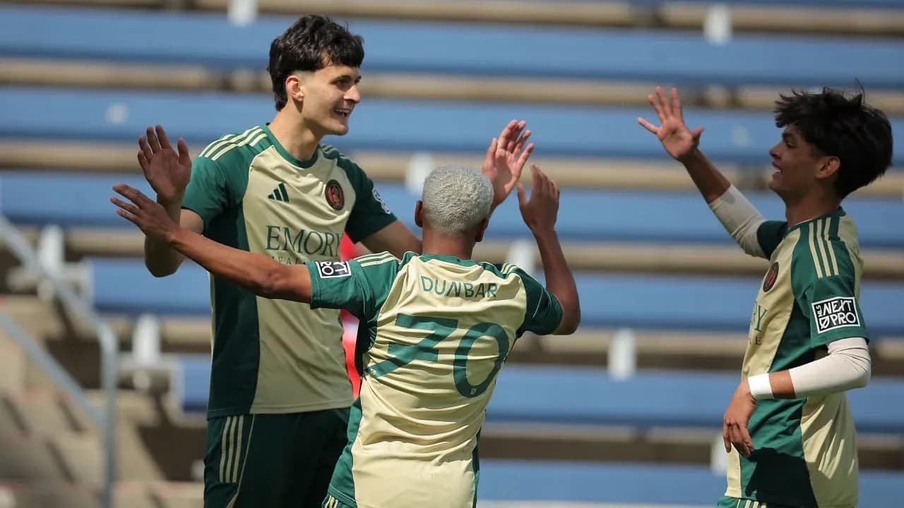Players celebrating a goal during MLS Next Pro match