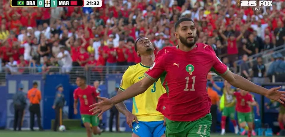 Morocco player celebrating goal against Brazil