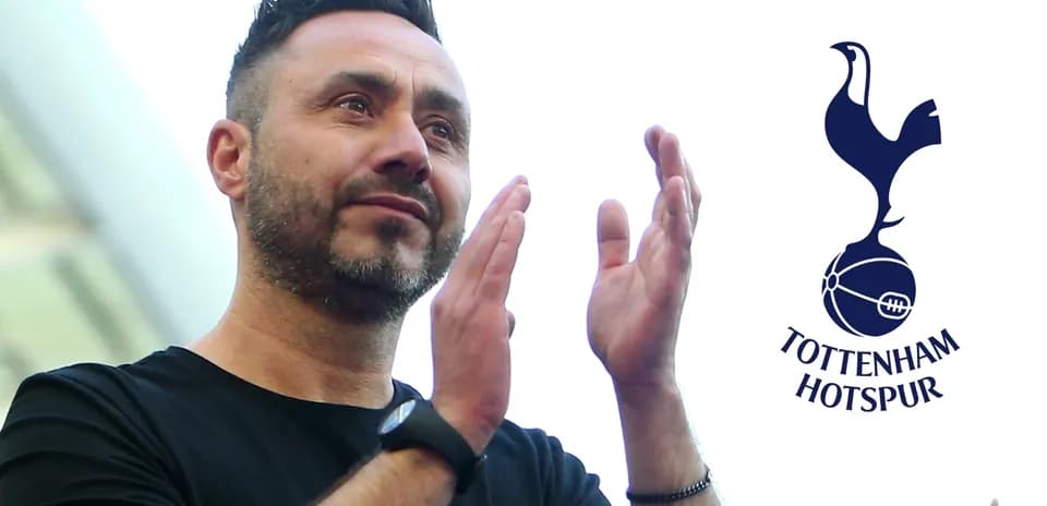 Coach applauding fans with Tottenham Hotspur logo
