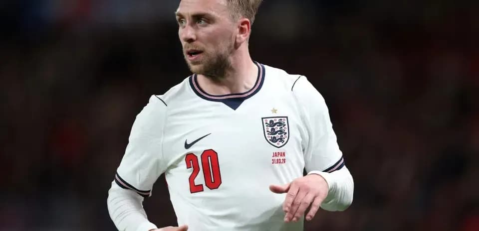Player in England jersey during match action