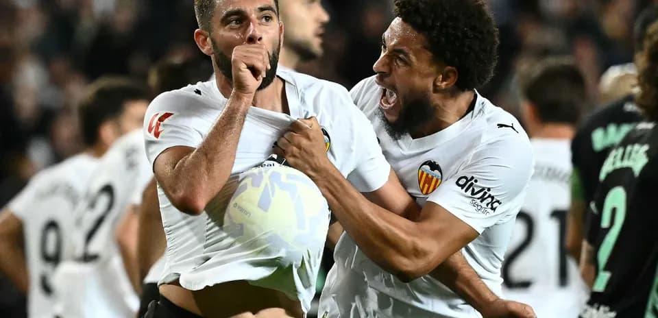 Valencia players celebrating a goal during match