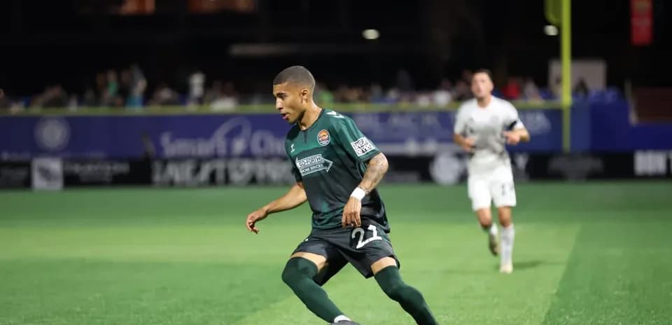 Player dribbling the ball during match