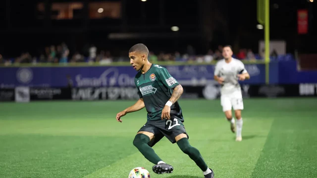 Player dribbling the ball during match