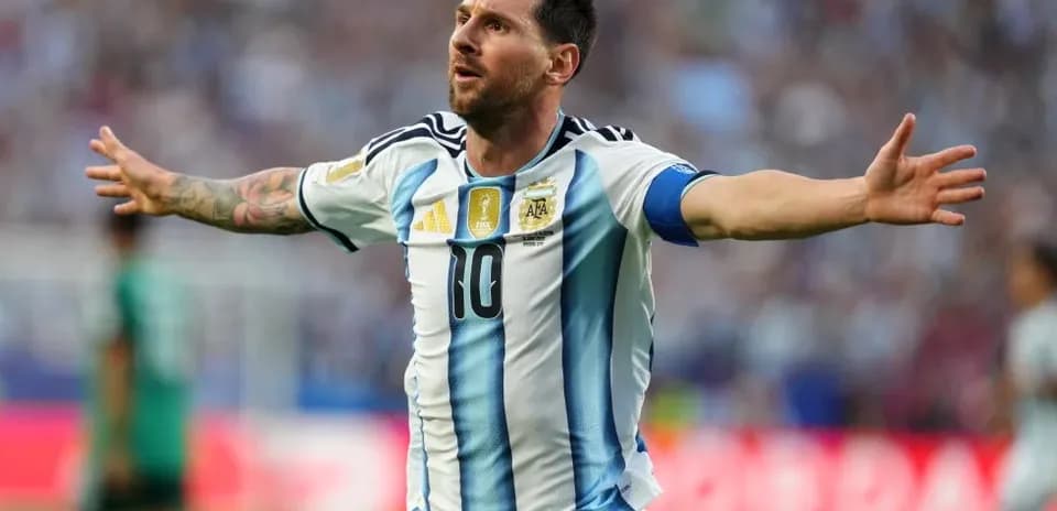 Player celebrating after scoring a goal for Argentina