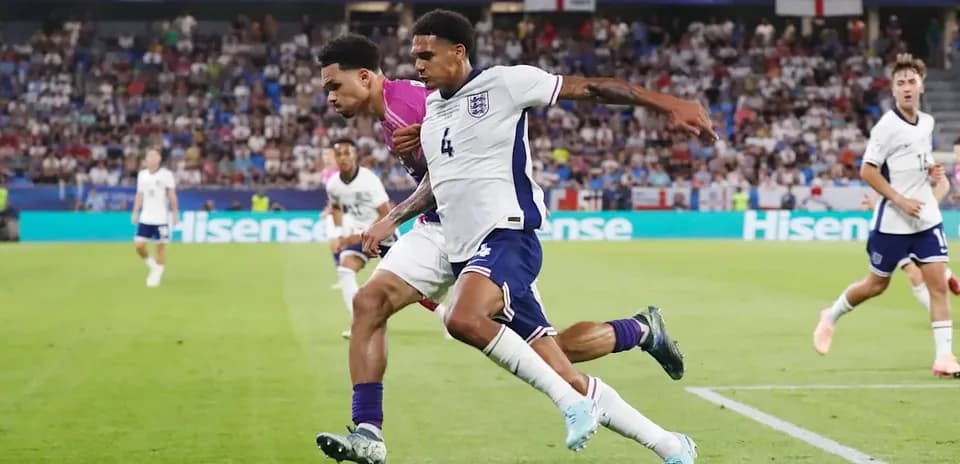England players battling for the ball during match