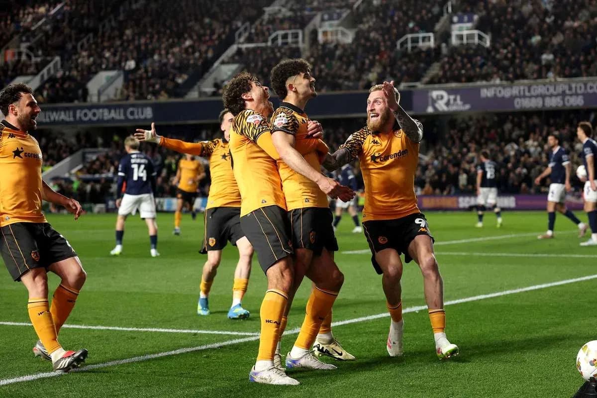 Wolverhampton players celebrating a goal on the pitch