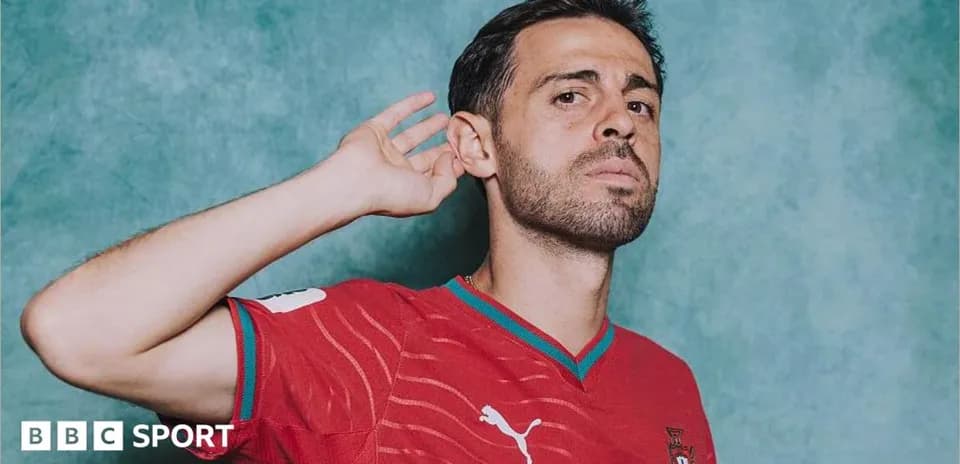 Football player posing in Portugal jersey