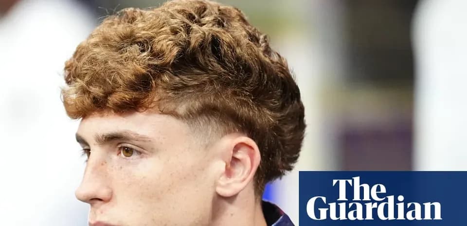 Player with curly hair during a press event