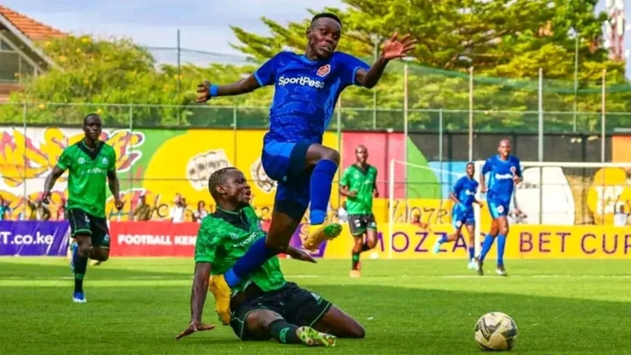 Player jumping over opponent during football match