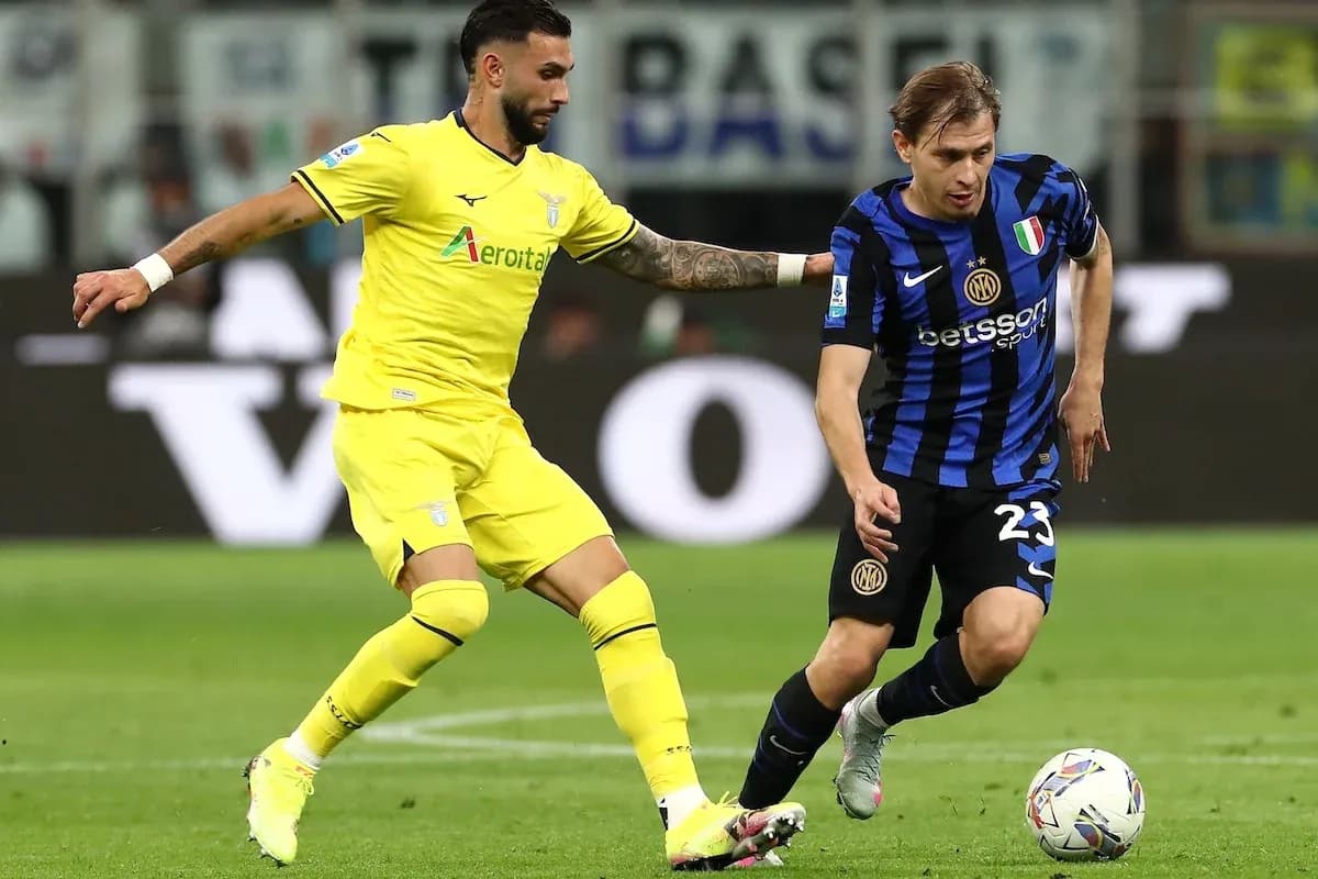 Lazio player tackling Inter player during match
