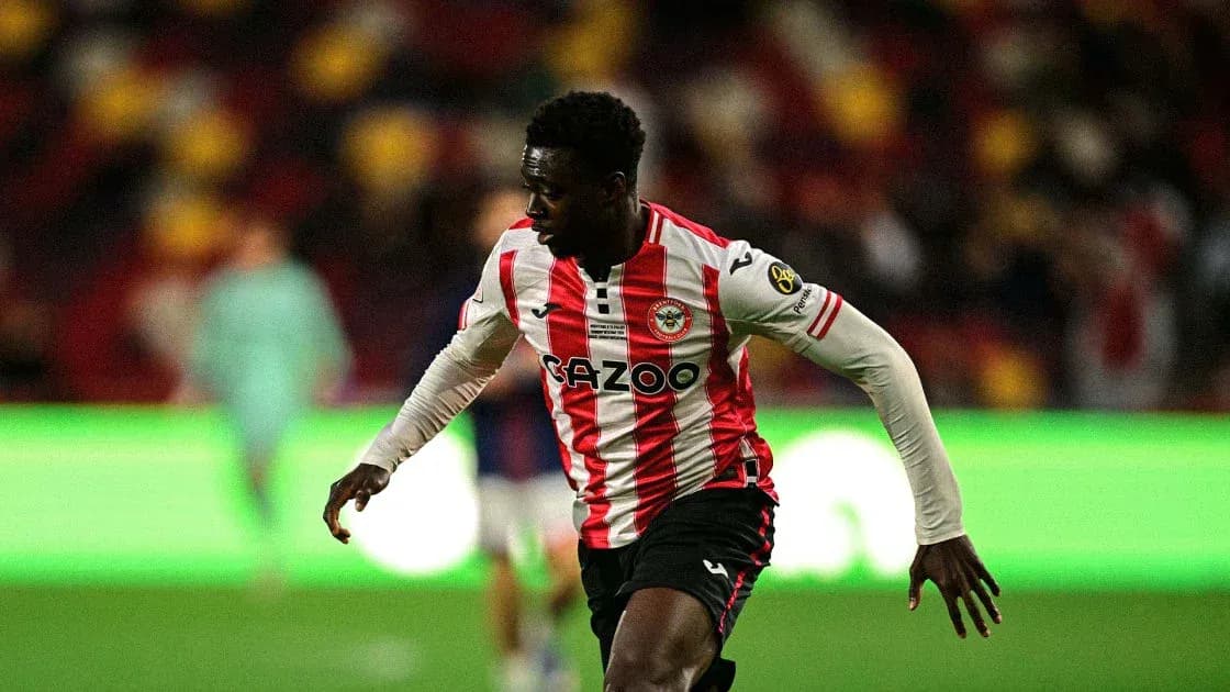 Brentford player running on the pitch during match