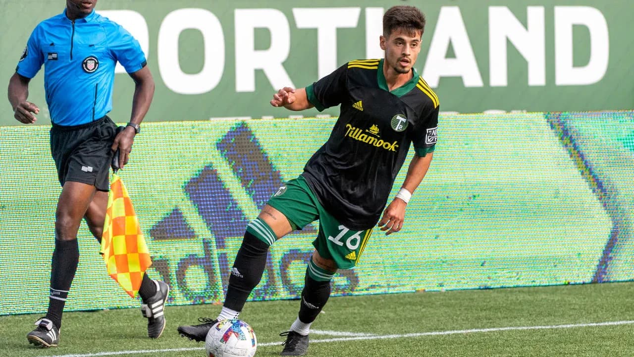Portland Timbers II player in action on field Portland Timbers II player in action on field