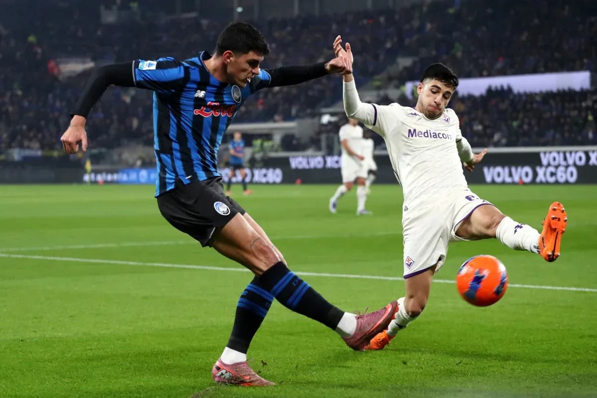 Player tackling during Fiorentina vs Atalanta match Player tackling during Fiorentina vs Atalanta match