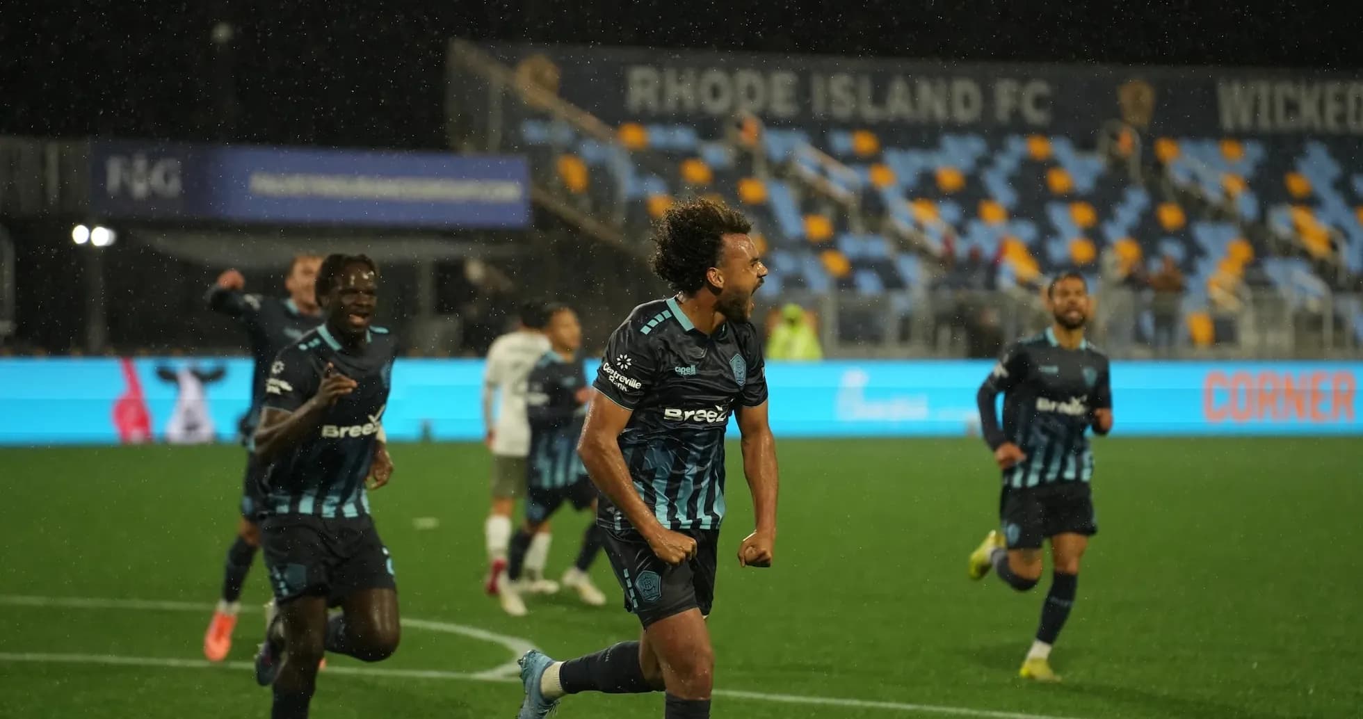 Rhode Island players celebrating a goal during match Rhode Island players celebrating a goal during match
