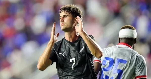 Player gesturing during a soccer match Player gesturing during a soccer match