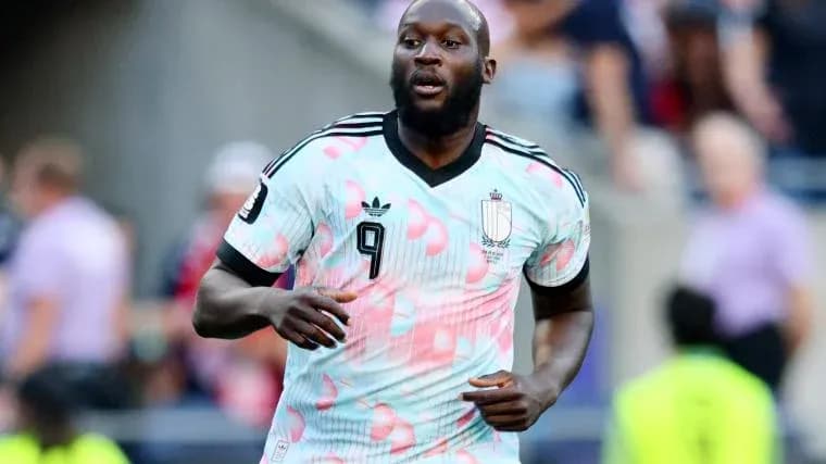 Player in colorful jersey running during match Player in colorful jersey running during match