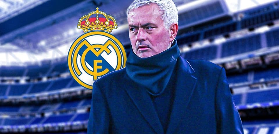 Manager in front of Real Madrid logo at stadium Manager in front of Real Madrid logo at stadium