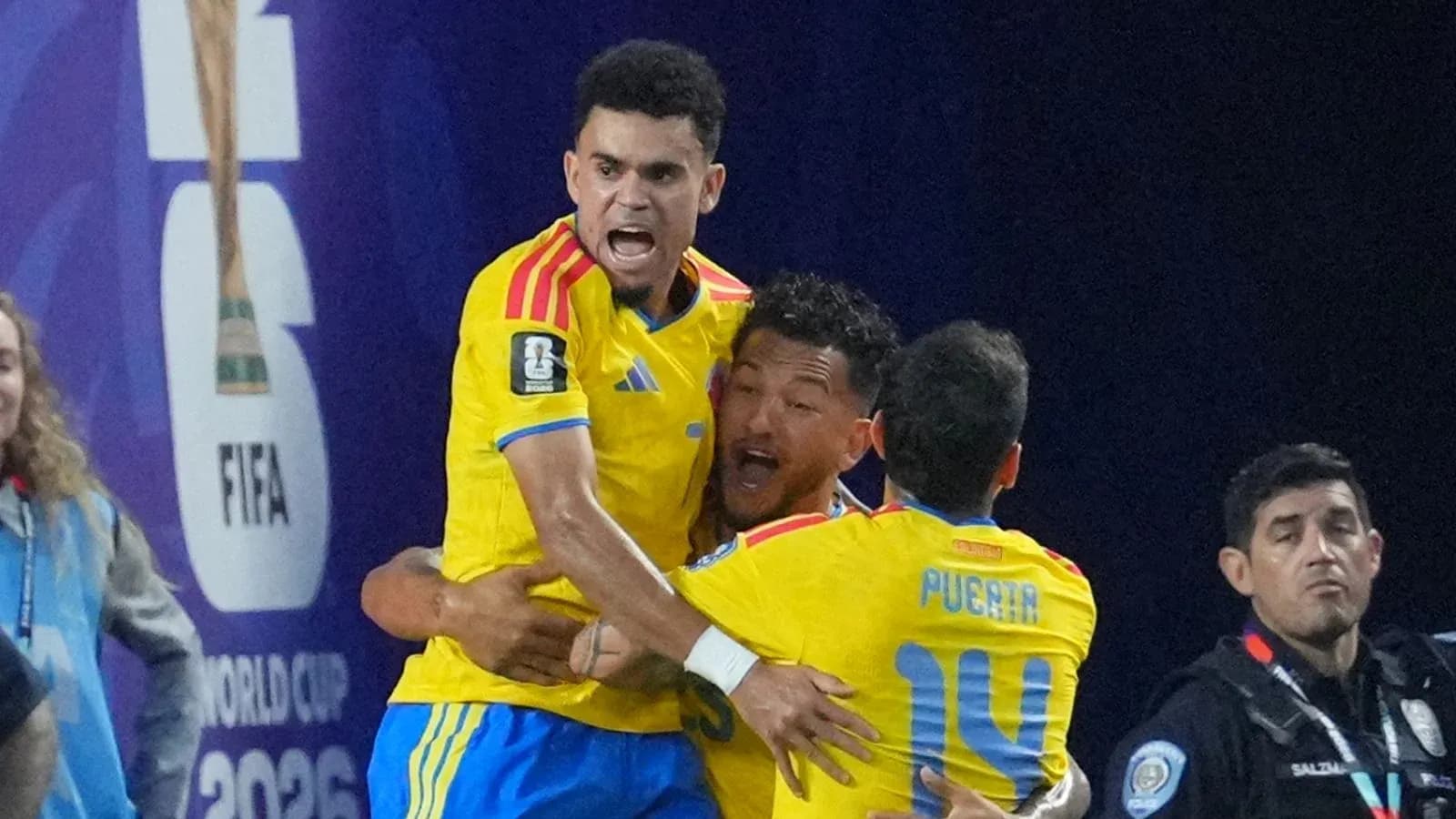 Players celebrating a goal during a match Players celebrating a goal during a match