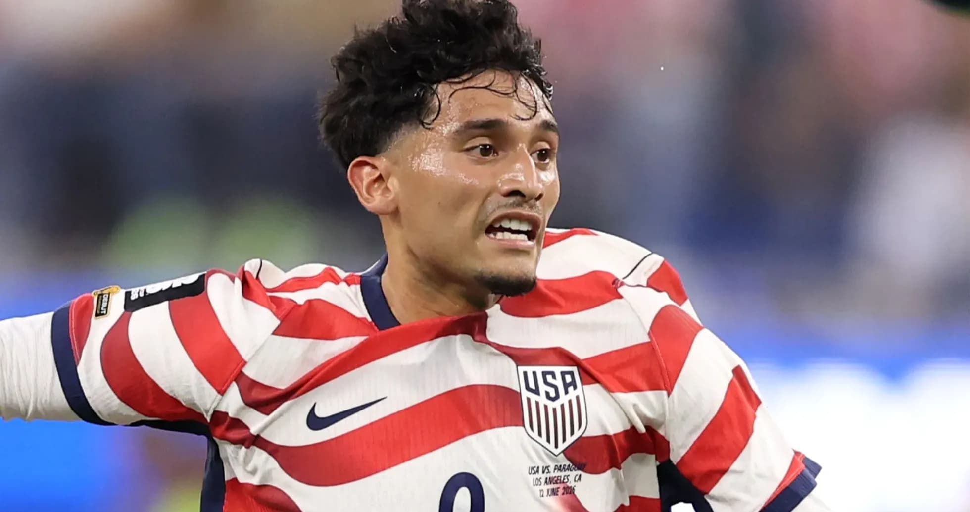 Player wearing USA jersey during soccer match Player wearing USA jersey during soccer match