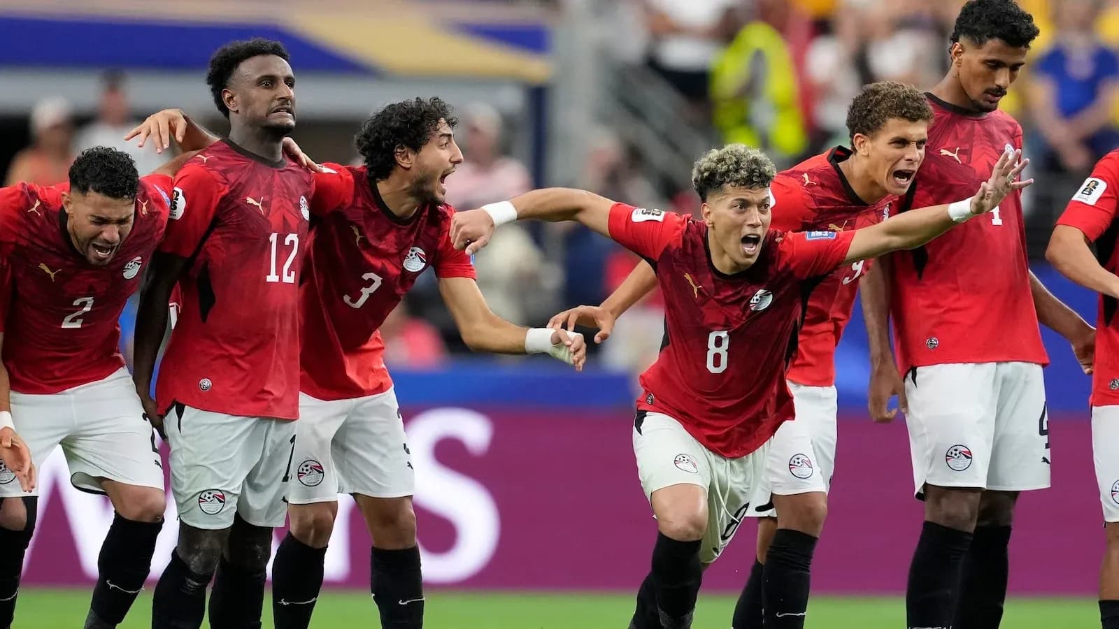 Egyptian players celebrating during a match Egyptian players celebrating during a match