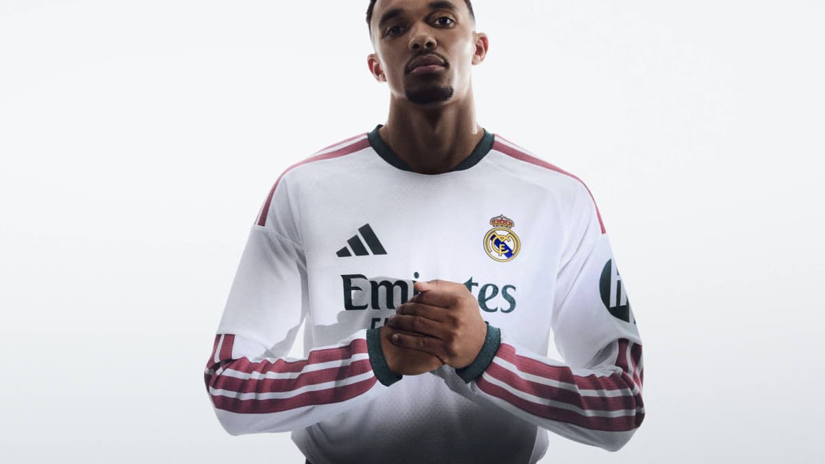 Player wearing Real Madrid jersey with crossed arms Player wearing Real Madrid jersey with crossed arms