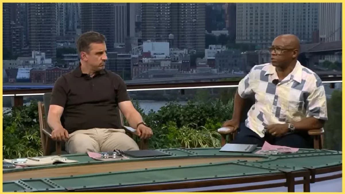 Two sports analysts seated at a discussion table Two sports analysts seated at a discussion table