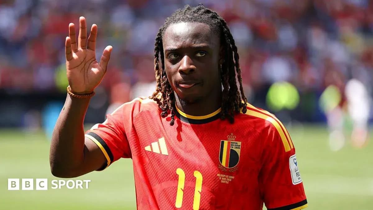 Player waving while wearing Belgium national team jersey Player waving while wearing Belgium national team jersey