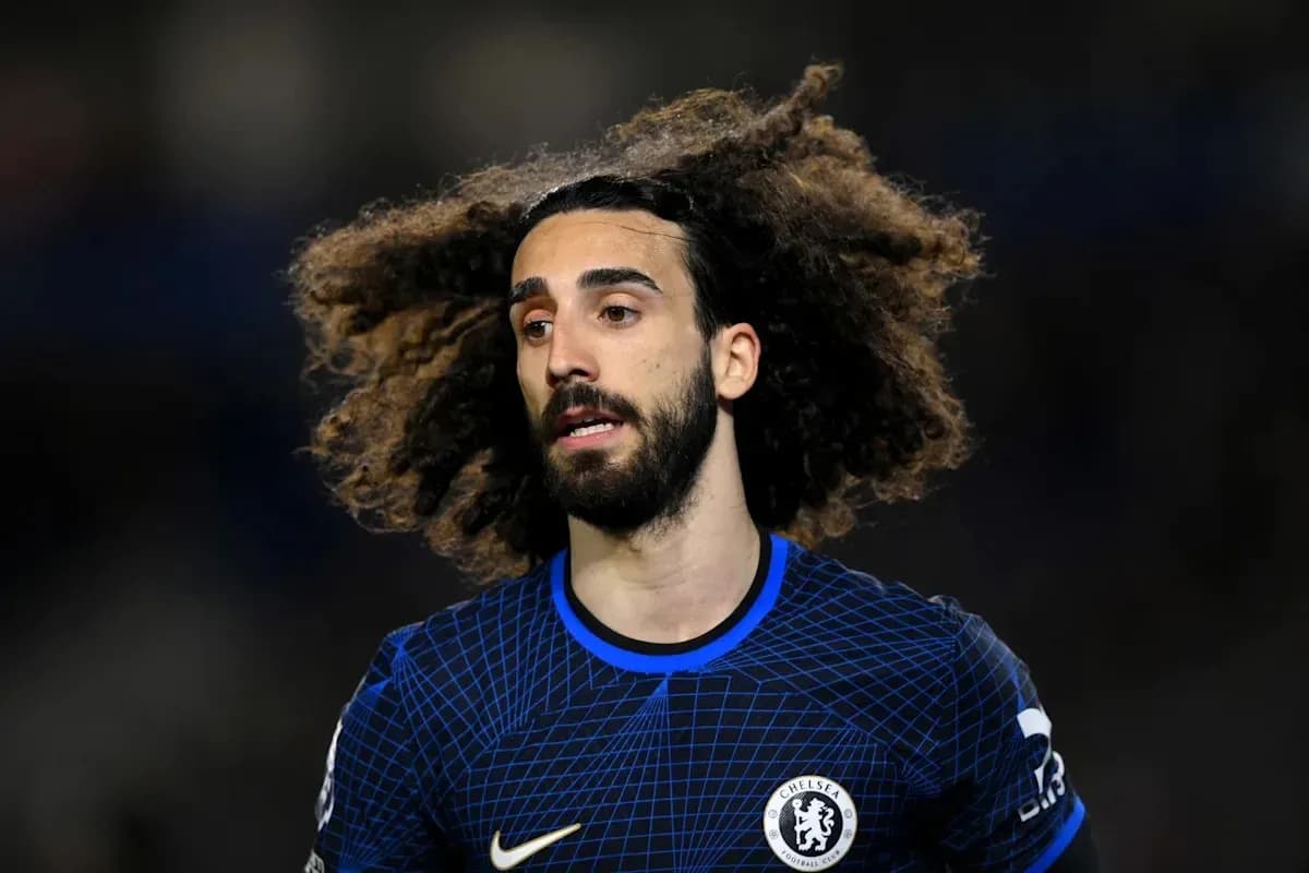 Player with curly hair in Chelsea jersey Player with curly hair in Chelsea jersey