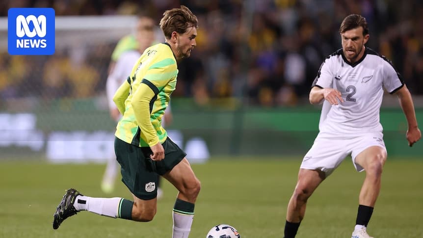 Player dribbling ball during Australia vs New Zealand match Player dribbling ball during Australia vs New Zealand match