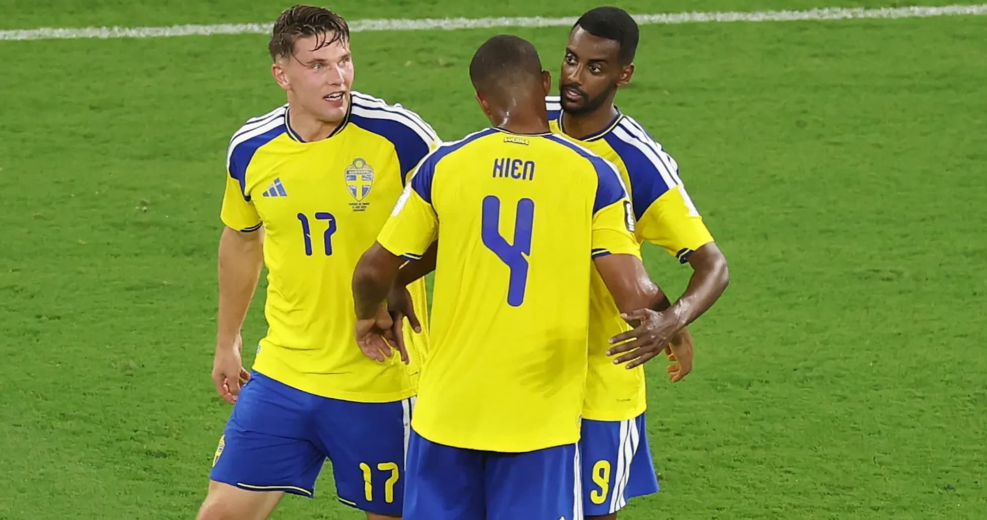 Sweden players celebrating on the field together Sweden players celebrating on the field together
