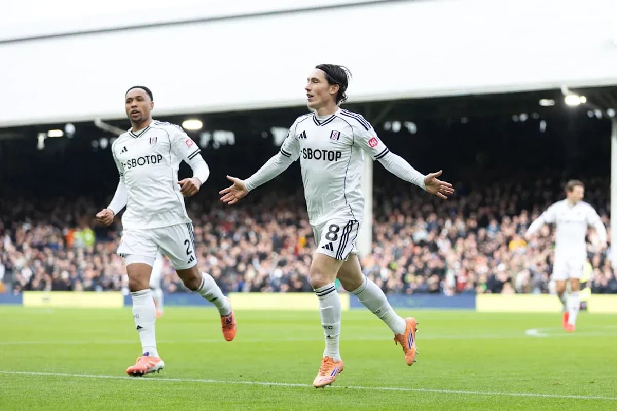 Fulham players celebrating a goal during a match Fulham players celebrating a goal during a match