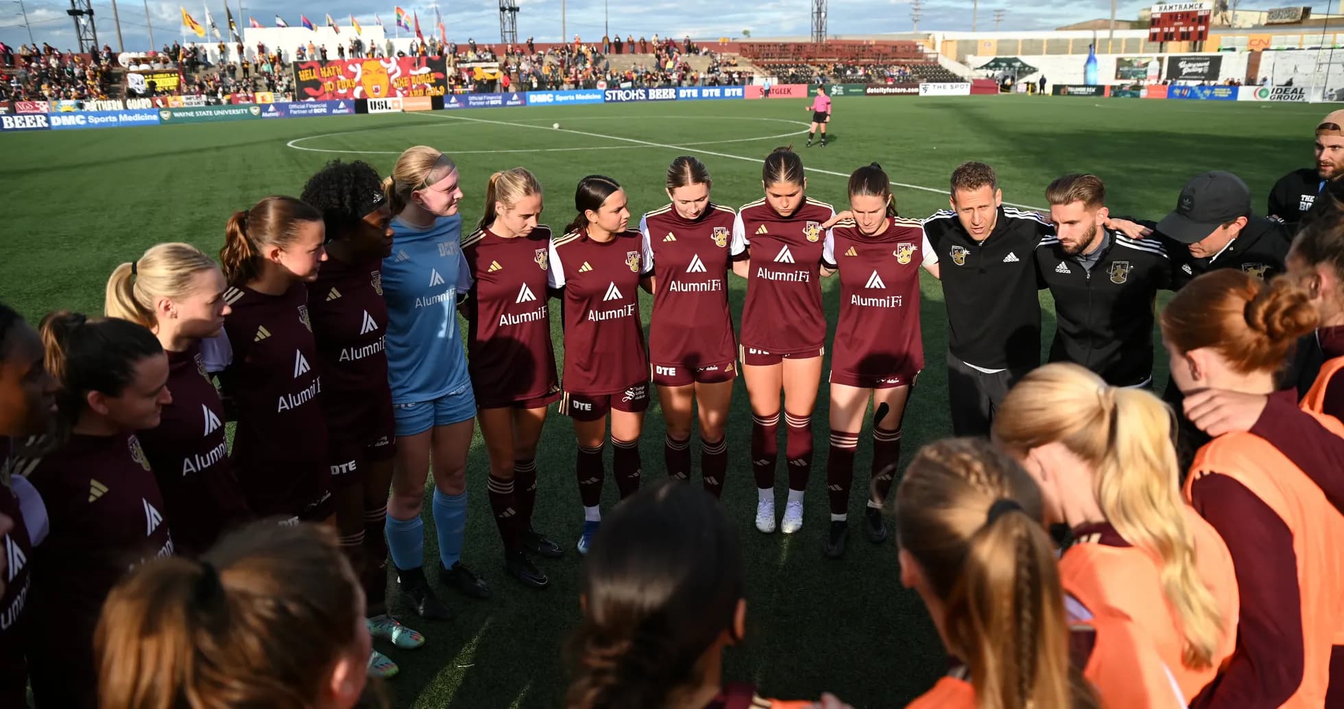 Detroit City women's team in pre-match huddle Detroit City women's team in pre-match huddle