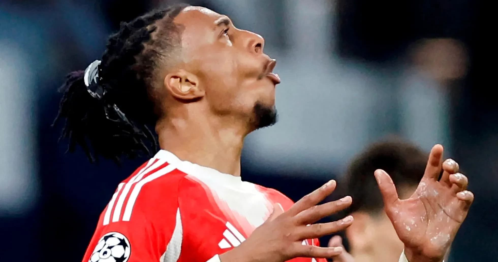 Player looking upwards during a Champions League match Player looking upwards during a Champions League match