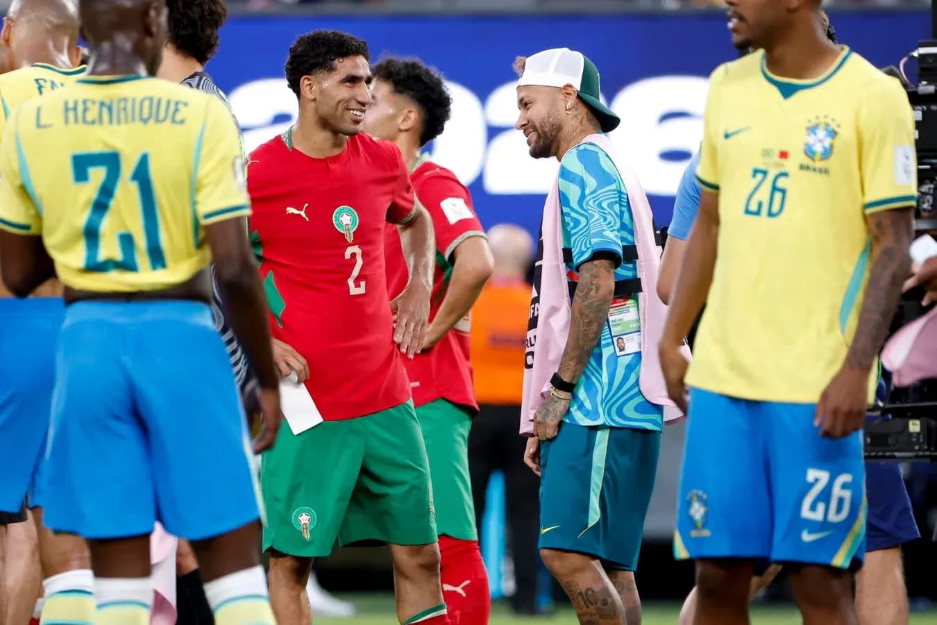 Players from Morocco and Brazil interacting post-match Players from Morocco and Brazil interacting post-match
